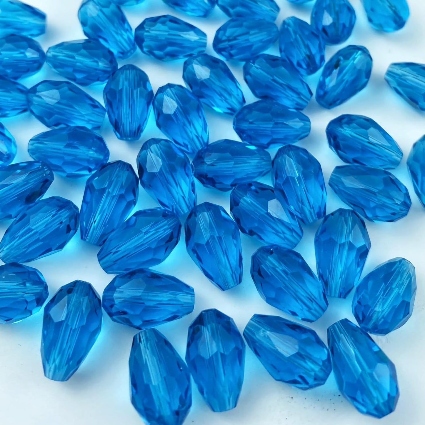 200pcs 4x6mm Teardrop Crystal Glass Beads Vertical Hole Faceted Glass Teardrop Spacer Beads for Bracelets Necklace Earring DIY Jewelry Making Craft(Lake Blue)