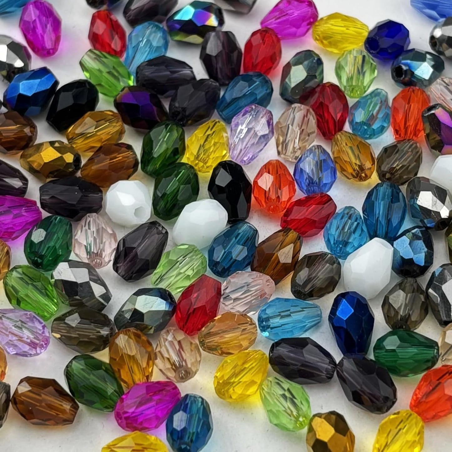 130pcs 6x8mm Teardrop Crystal Glass Beads for Jewelry Making, Faceted Vertical Hole Teardrop Glass Spacer Beads for Wind Chimes Bracelet Earring Necklace DIY Craft(Mix Colors)