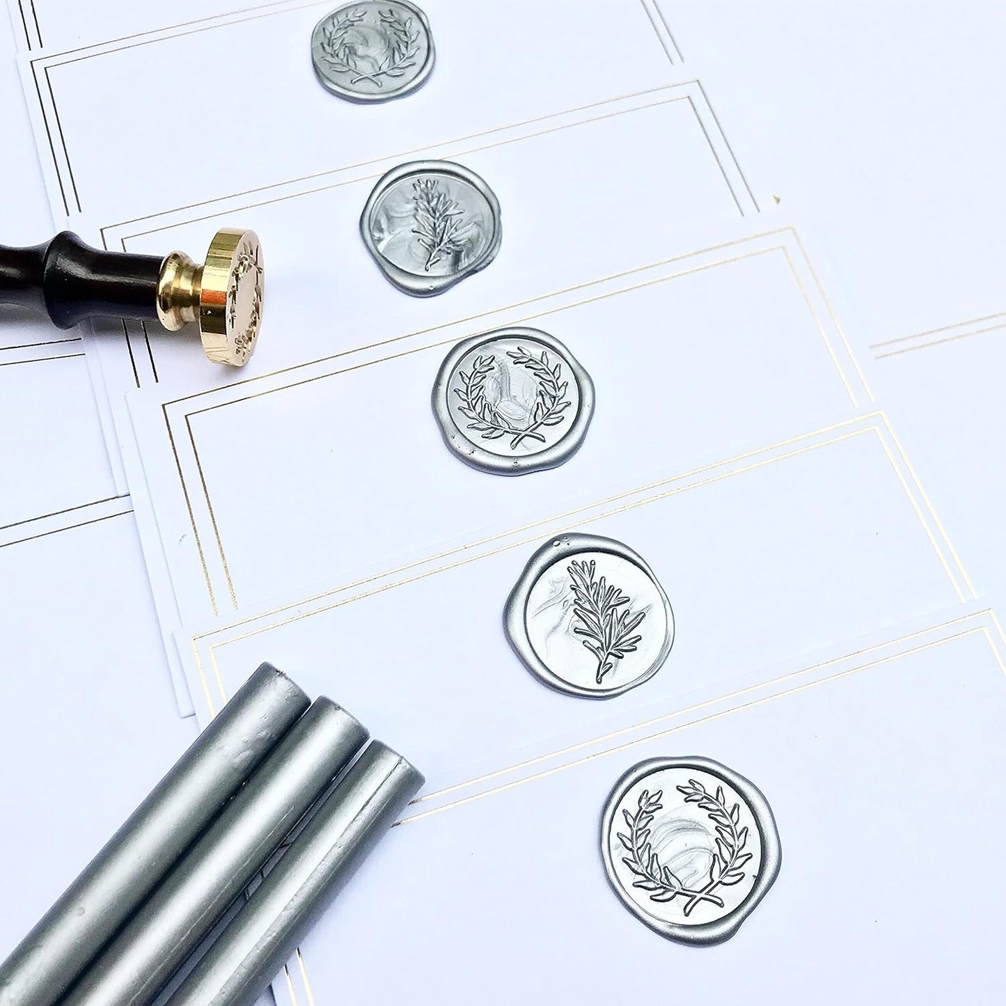 UNIQOOO Mailable Glue Gun Sealing Wax Sticks for Wax Seal Stamp - Metallic Silver, Great for Christmas Cards, Wedding Invitations, Cards Envelopes, Snail Mails, Wine Packages, Gift Ideas, Pack of 8